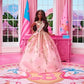 Barbie The Movie Doll President Wearing Shimmery Pink Gold Dress with Sash