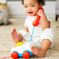 Fisher-Price Toddler Pull Toy Chatter Telephone Pretend Phone with Rotary Dial and Wheels