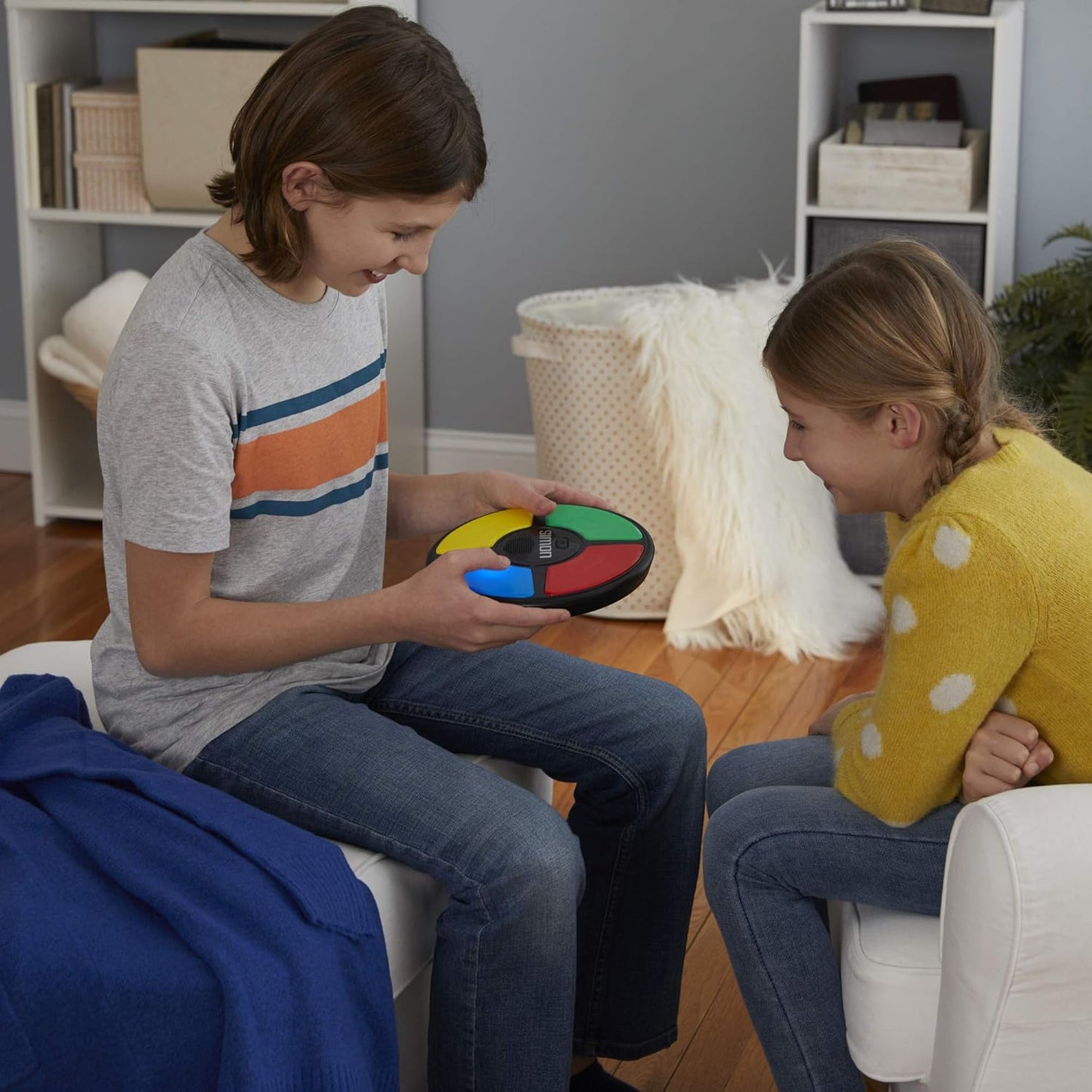 Hasbro Gaming Simon Handheld Electronic Memory Game With Lights and Sounds for Ages 8 and
